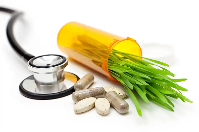 An artistic rendition of herbs and supplements and pill bottle for chronic care management