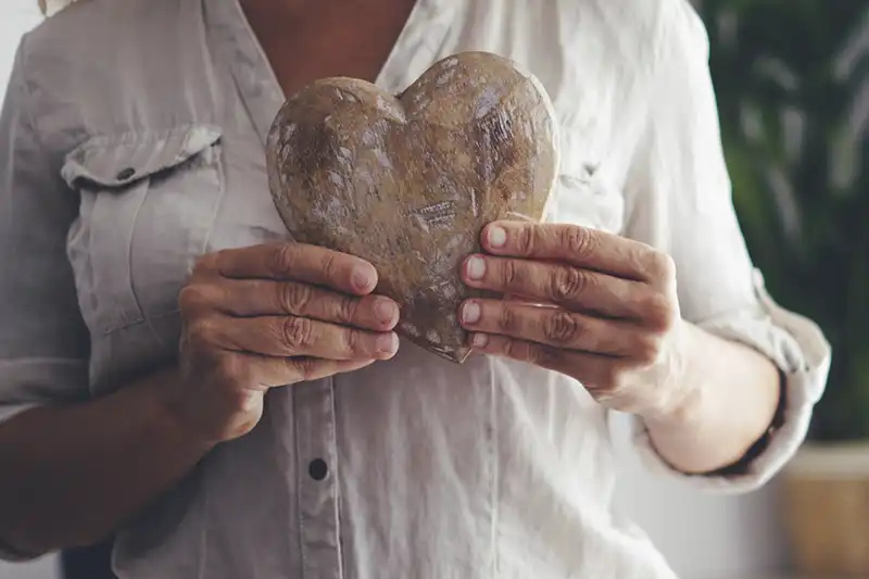 Woman Holding Decorative Heart